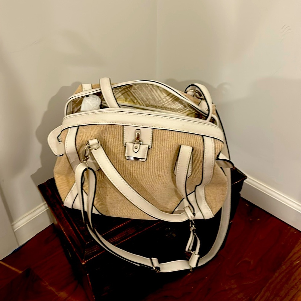 Women’s cream and off-white shoulder bag by London Fog.